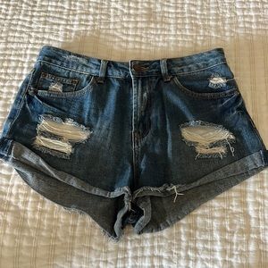 Super cute blue jean shorts with rips, perfect for summer!